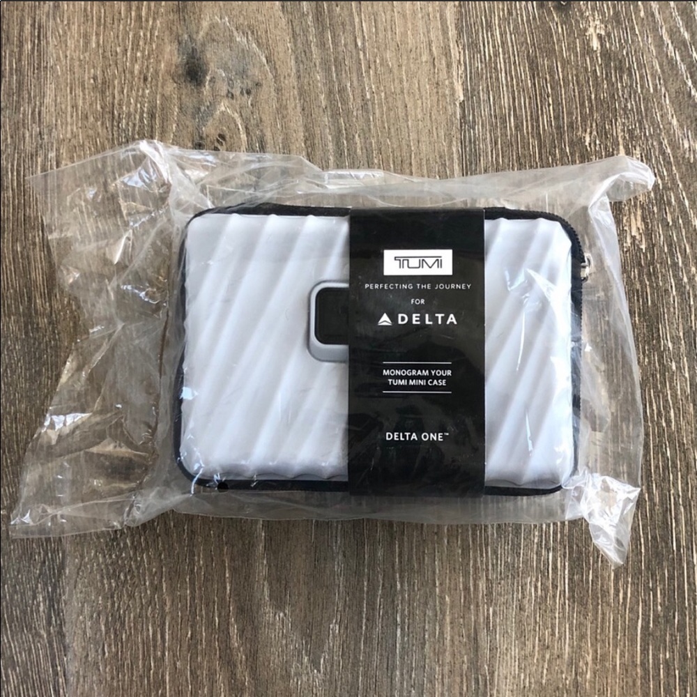 NEW monogram TUMI travel/ toiletry case